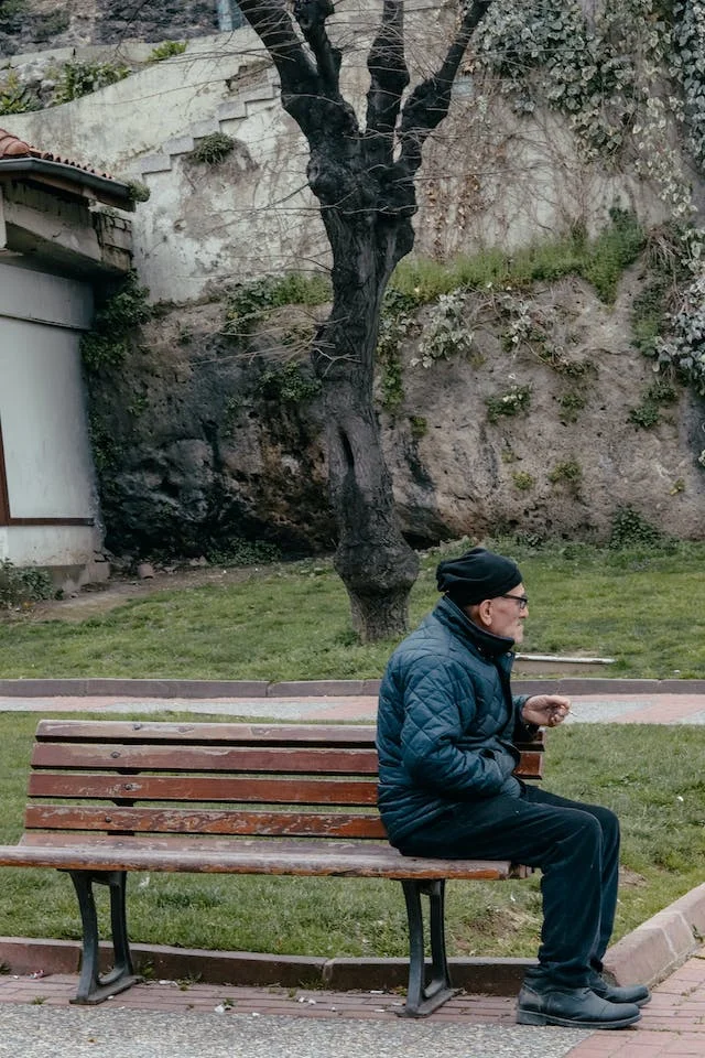 Elderly Man Sitting Alone